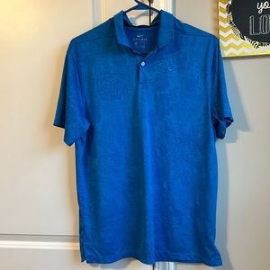 Mens Nike Dri fit polo with floral design and mesh accent under collar